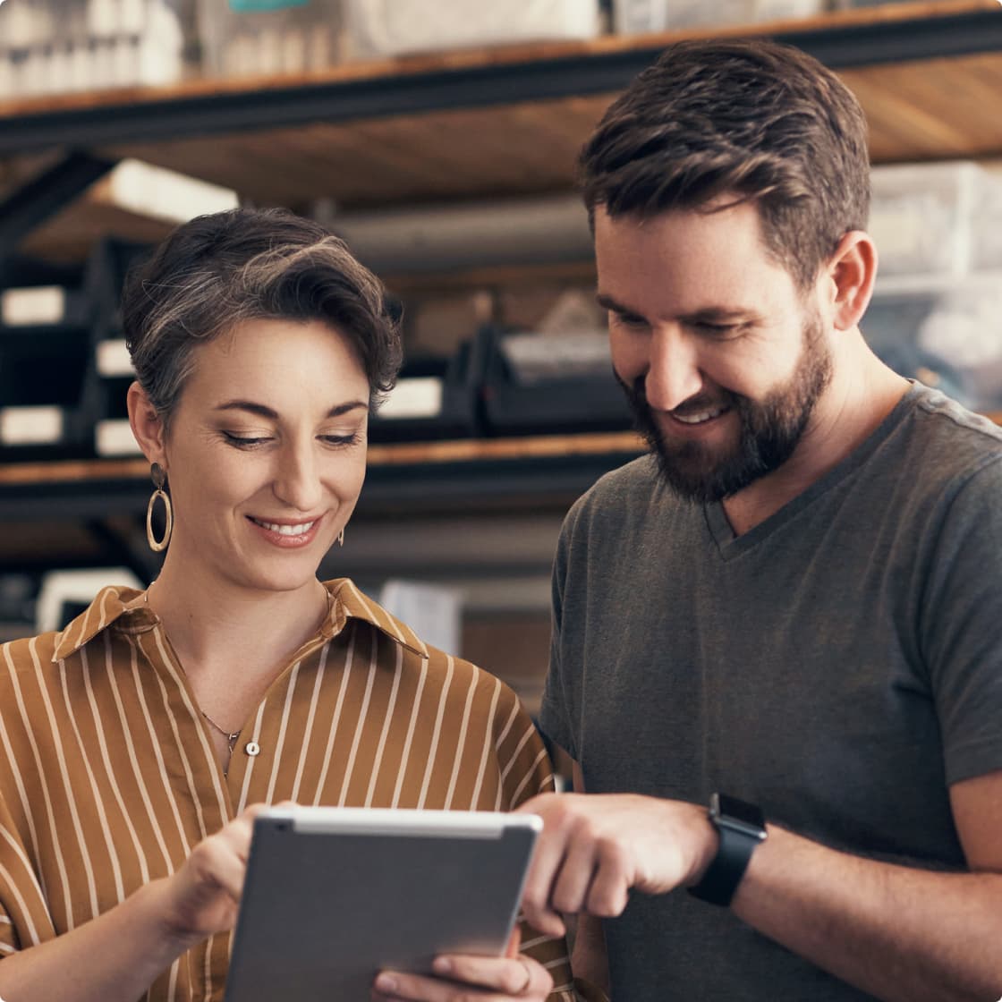 team looking at a tablet
