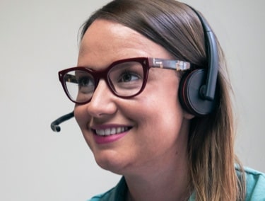 Support agent with headphones