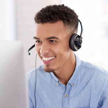 Call center agent wearing headphones