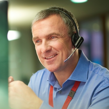 Call center receptionist with headphones