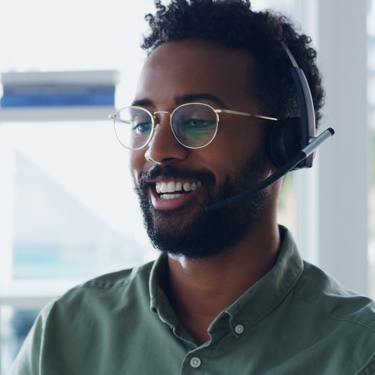 Smiling man wearing headphones